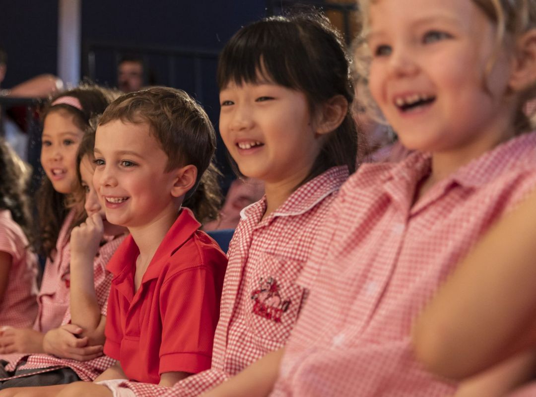 Photo of students sat together 